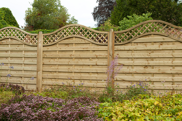 a beautiful run of wooden fencing that will need fence preservation and fence post protection