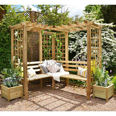 the trellis on the sides of this corner arbour seat is ideal trellis for vertical gardening