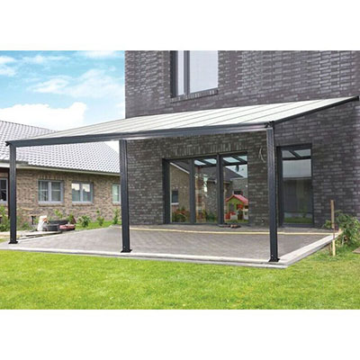 a lean to carport positioned against the wall of a home