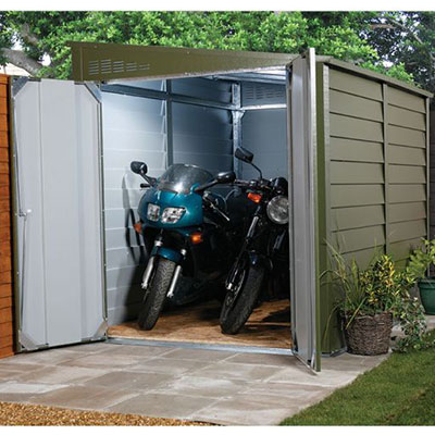 2 motorbikes parked inside a secure motorbike garage